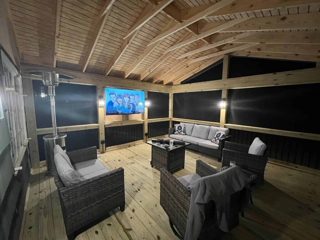 Screened porch with wood decking and vaulted roof by Elite Decks, deck builder serving Homewood, AL